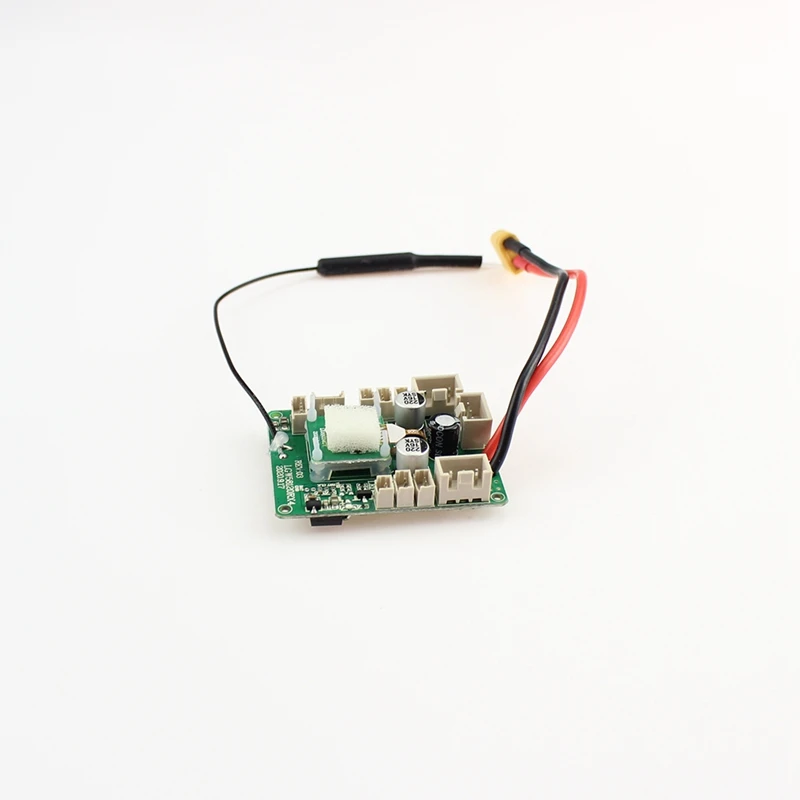 Carte mère récepteur XK X450 posée sur fond blanc, pièce de rechange pour hélicoptère radiocommandé