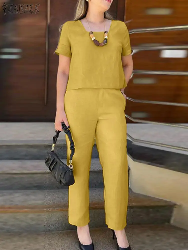 

Костюм спортивный женский летний из блузки с коротким рукавом и брюк