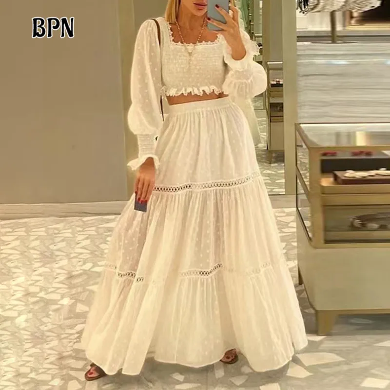 

BPN Casual Solid Two Piece Sets For Women Sqaure Collar Long Sleeve Tops High Waist Hollow Out A Line Skirts Elegant Set Female