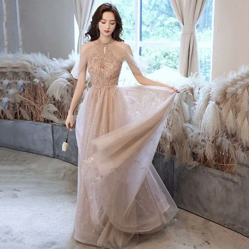 

Champagne color Art test evening dress 2023 new elegant high-end light luxury dinner host hanging neck can be worn daily