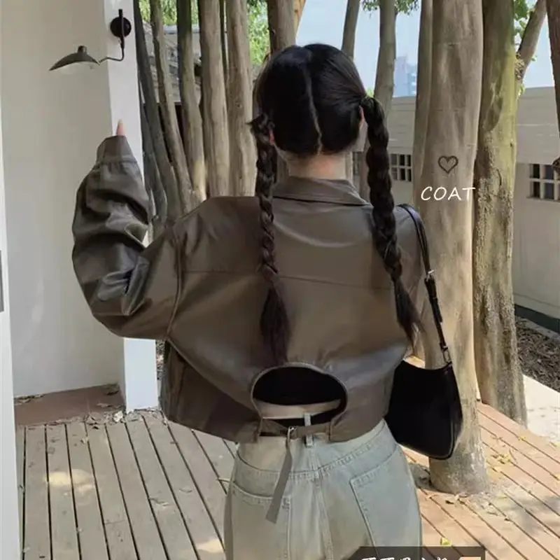 Short Leather Jacket Women's Spring Korean Version 2024 Backless Design Loose Fitting Long Sleeved Jacket Motorcycle Suit Trend