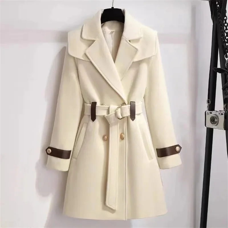 The new women's winter 2022 design sense fashion temperament wool coat with cotton thickening warm waist slimming medium length