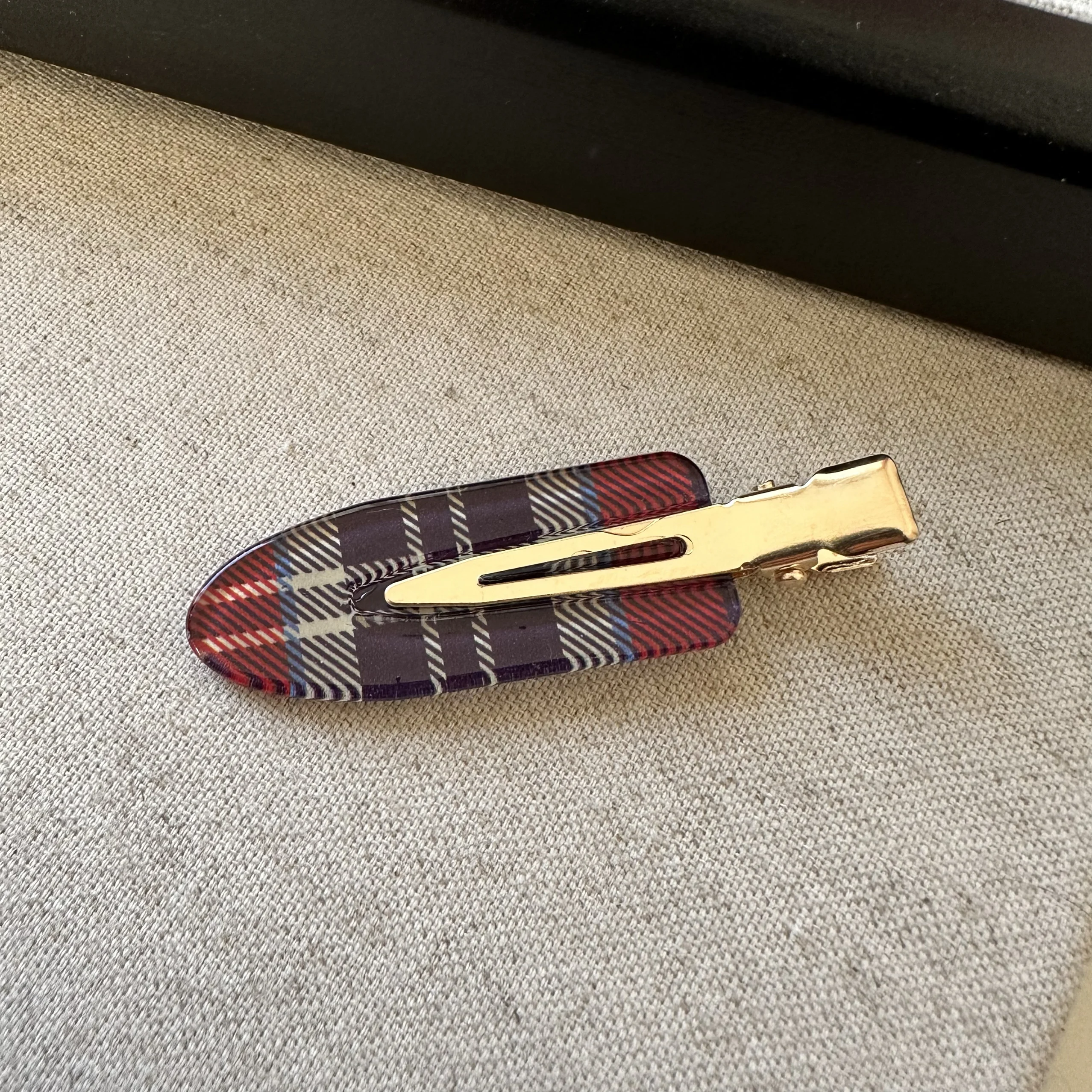 A large black and red plaid