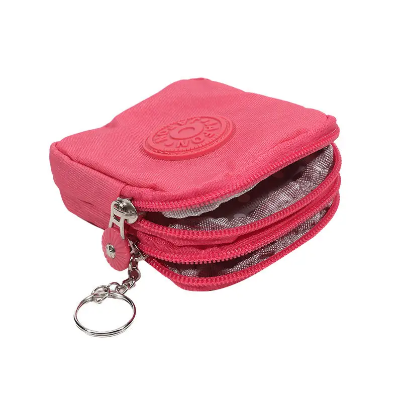 Mini Nylon Coin Purse in hand