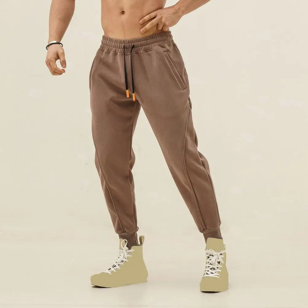 Description Picture 2 of itemMen Sport Pants Loose Ankle-banded Side Pockets Drawstring Elastic Waist Soft Breathable Solid Color Gym Traning Jogging Sweatpa