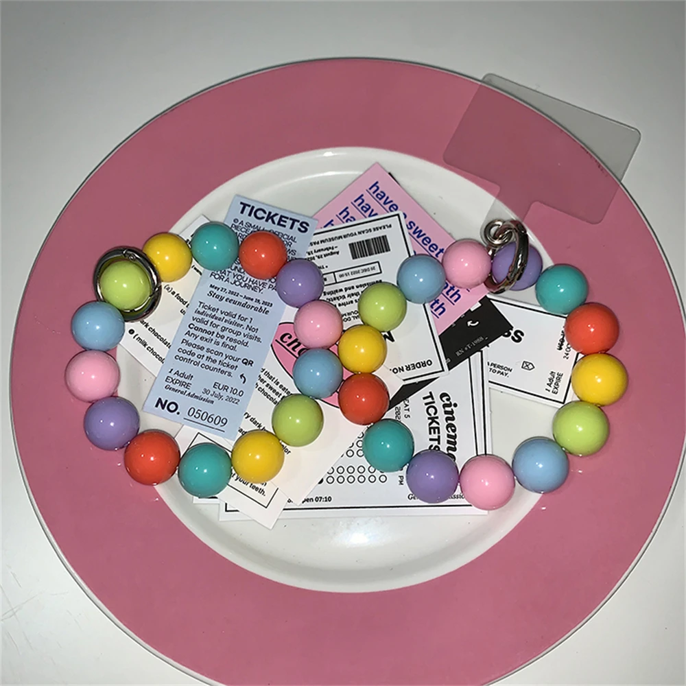 Bracelet de luxe brodé coloré série acrylique collier de téléphone portable iPhone 14 Pro photo bataille femmes perdues bijoux de série suspendus_voghion.com