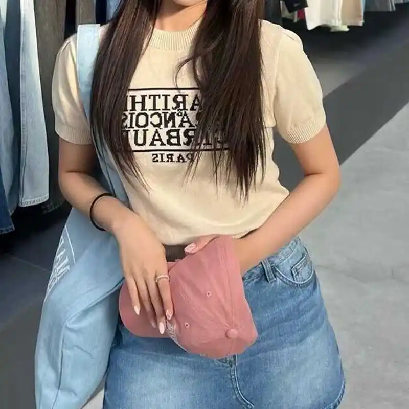 

Женский трикотажный хлопковый свитер с коротким рукавом и пышными рукавами