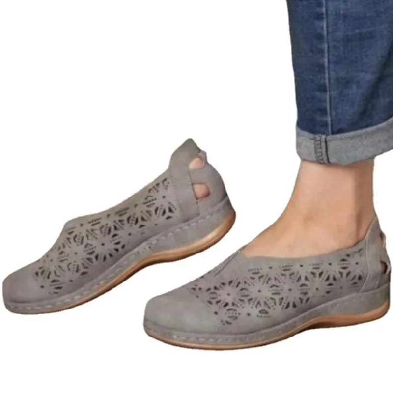 New casual flat bottomed hollowed out hole shoes for women with retro round toe, one legged loafers, lazy single shoes