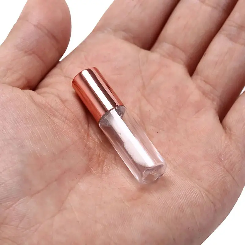 

Оптовая продажа, пустые прозрачные ПЭТ тюбики для блеска для губ объемом 1,2 мл, пластиковые тюбики для губной помады, косметический контейнер с розовым золотым колпачком