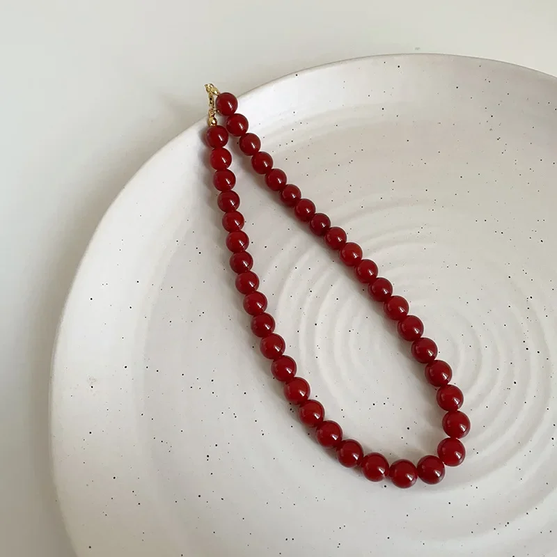 Minar Elegant Natural Shell Beaded Necklace with Silver-Plated Chain