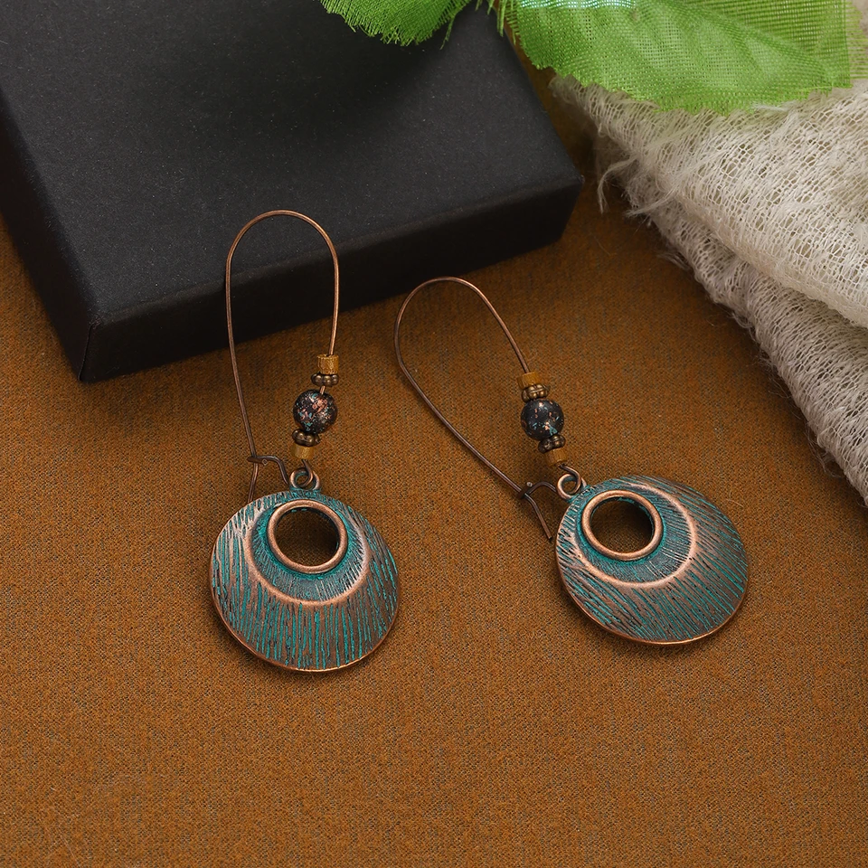 Set di orecchini con nappa rotonda in legno etnico Boho per