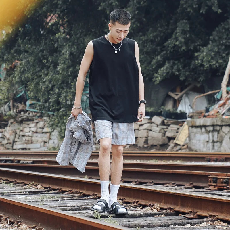 

Summer Hong Kong style solid color sleeveless men's Korean version trendy loose shoulder tank top with short sleeved bottom