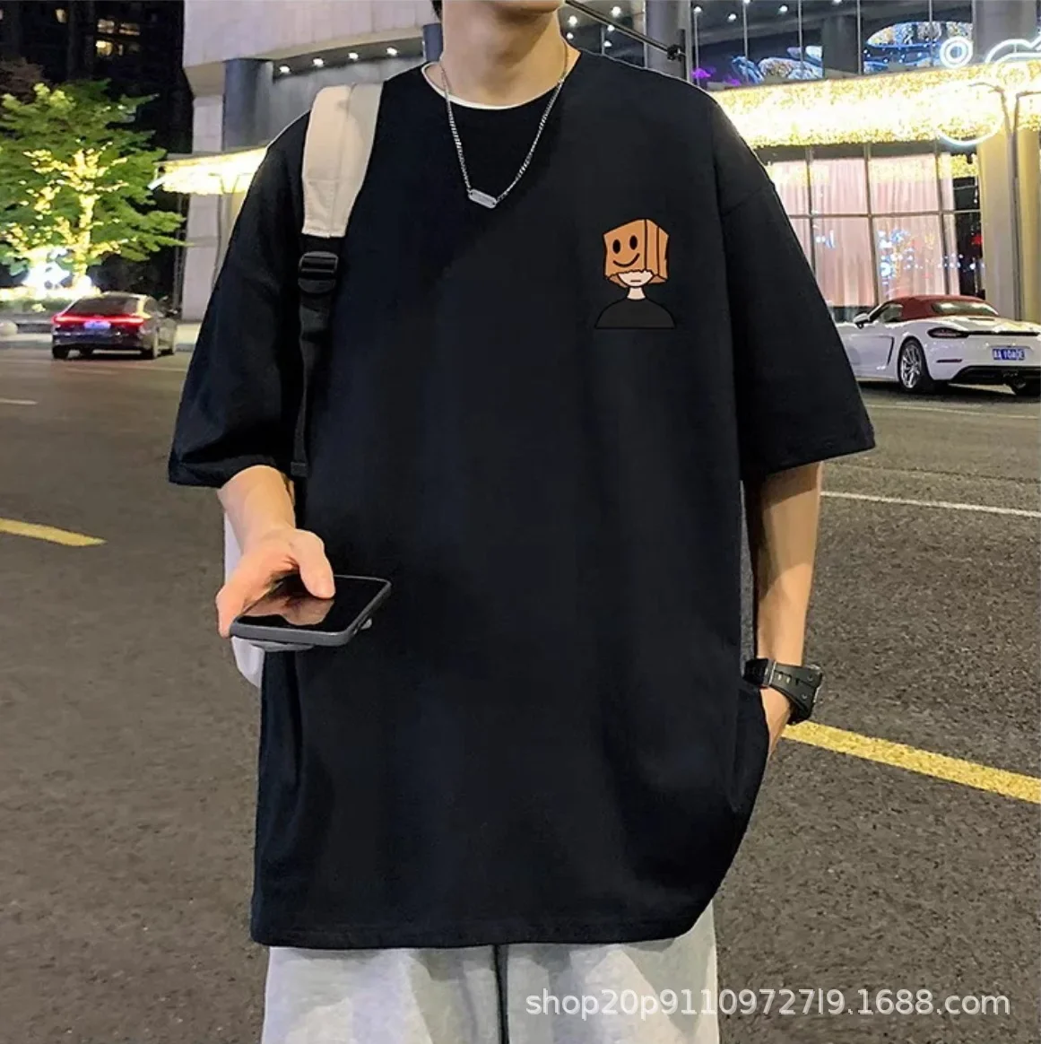 فضفاض عصري قصير الأكمام الرجال تي شيرت تنفس الكرتون طباعة الصيف أزياء عارضة أعلى نصف كم هونغ كونغ نمط المحملة