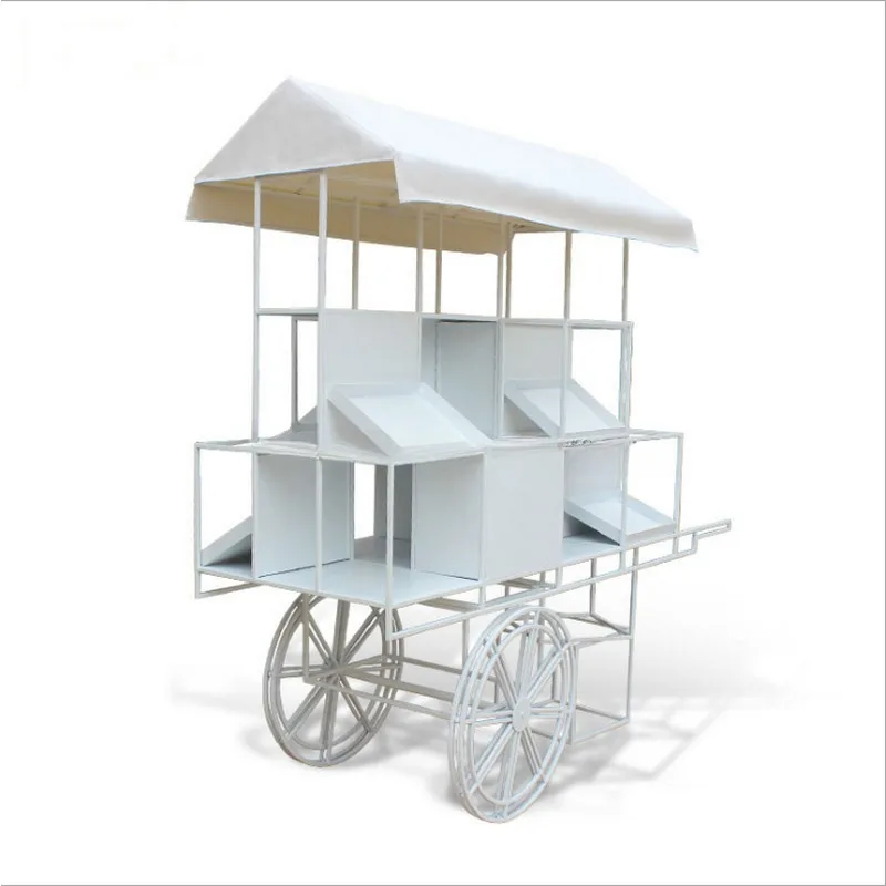 

white iron wedding dessert cart for wedding outdoor decoration