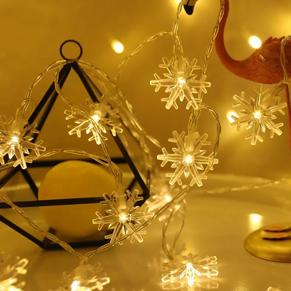 thumbnail image 1 of Guirnaldas de luces navideñas con forma de estrella y copo de nieve de 10 m, 20 m y 30 m para exteriores, para decoración de habitaciones, bodas, fiestas y Año Nuevo, 1 of 5