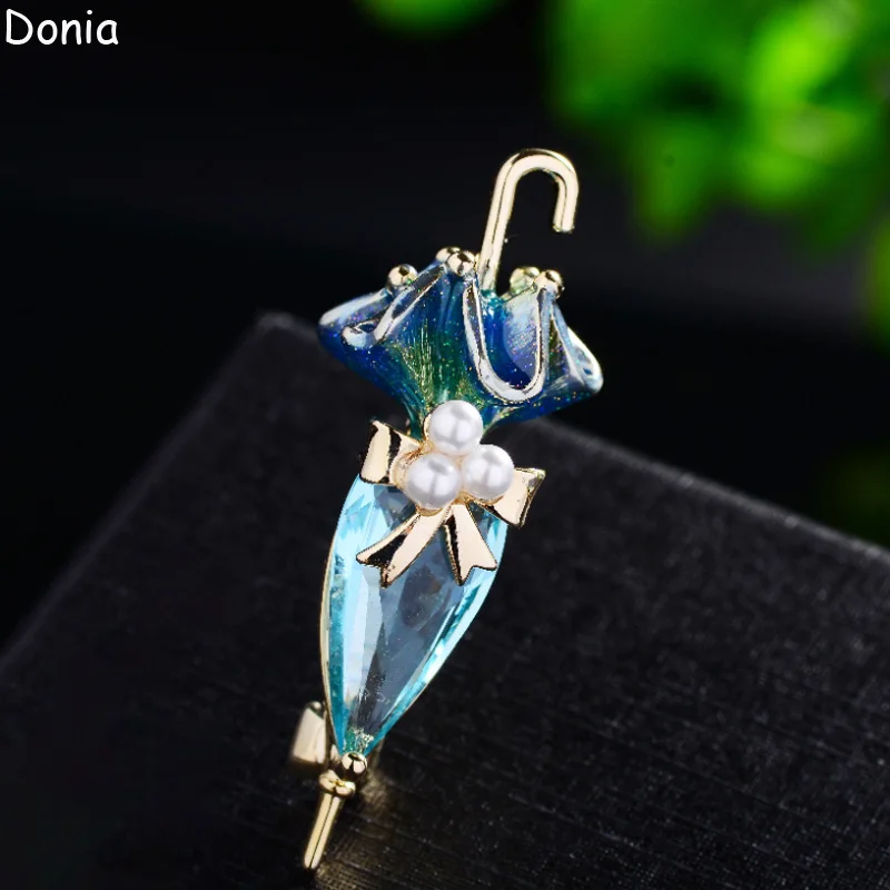 

Donia Jewelry Fashion Enamel Titanium Steel Micro-Inlaid AAA Colored Zircon Umbrella Brooch Luxury Retro Pearl Pin.