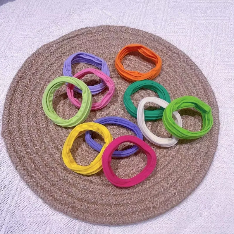 alt="A set of 10 Pastel Bow Scrunchies, velvet hair ties in various colors.