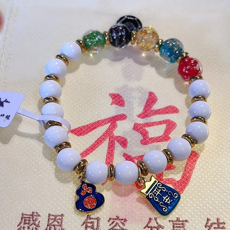 

Xiangji Same Style Fragrant White Porcelain Glazed Gold Swallowing Bracelet Hand String Female Multi Treasure Rosary China-chic