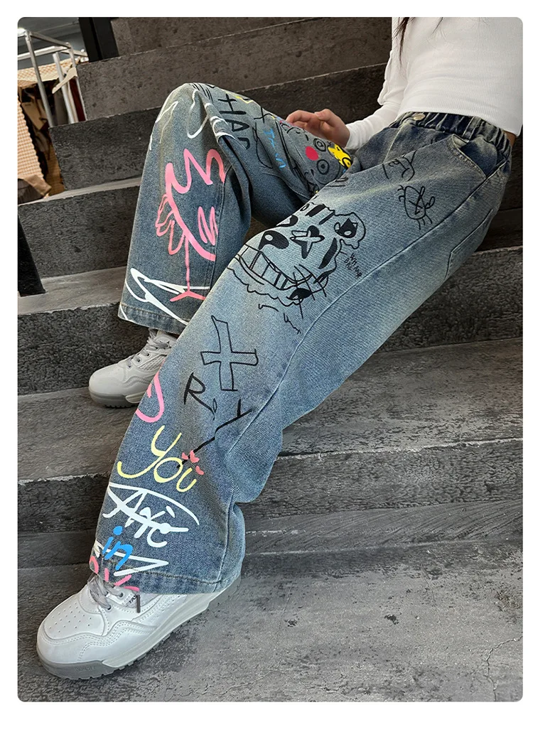 تصميم جديد للأطفال مطبوعة الهيب هوب الجينز للفتيات موضة عالية الشارع الشهير الدنيم السراويل الاطفال العصرية الكرتون الجينز السراويل 4-14T