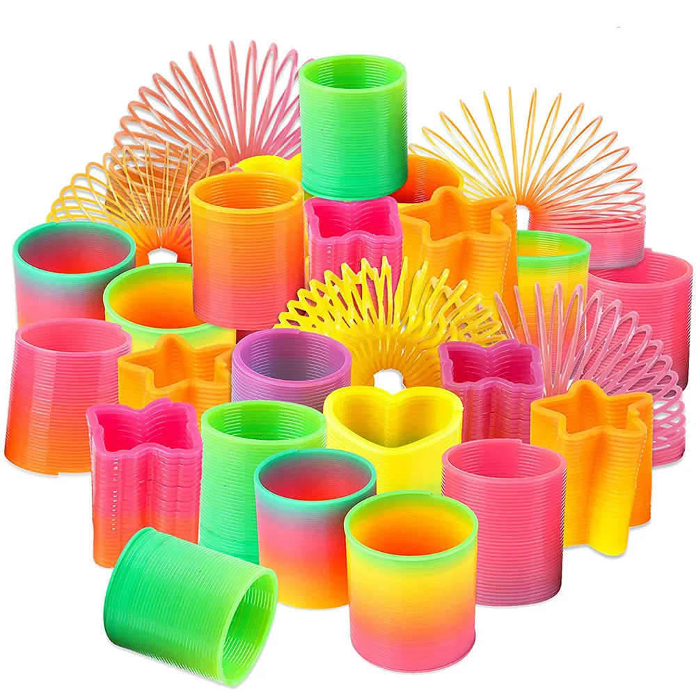 Giocattolo a molla arcobaleno (confezione da 12) Mini giocattolo a molla a  spirale in plastica Goody Bag Filler bomboniere calze per bambini ragazzi  ragazze