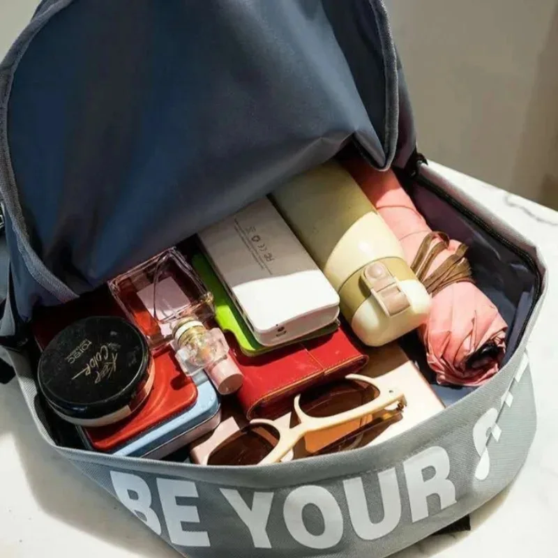 Fashion trend backpack for men and women, high school student bag, large capacity, Korean version of the