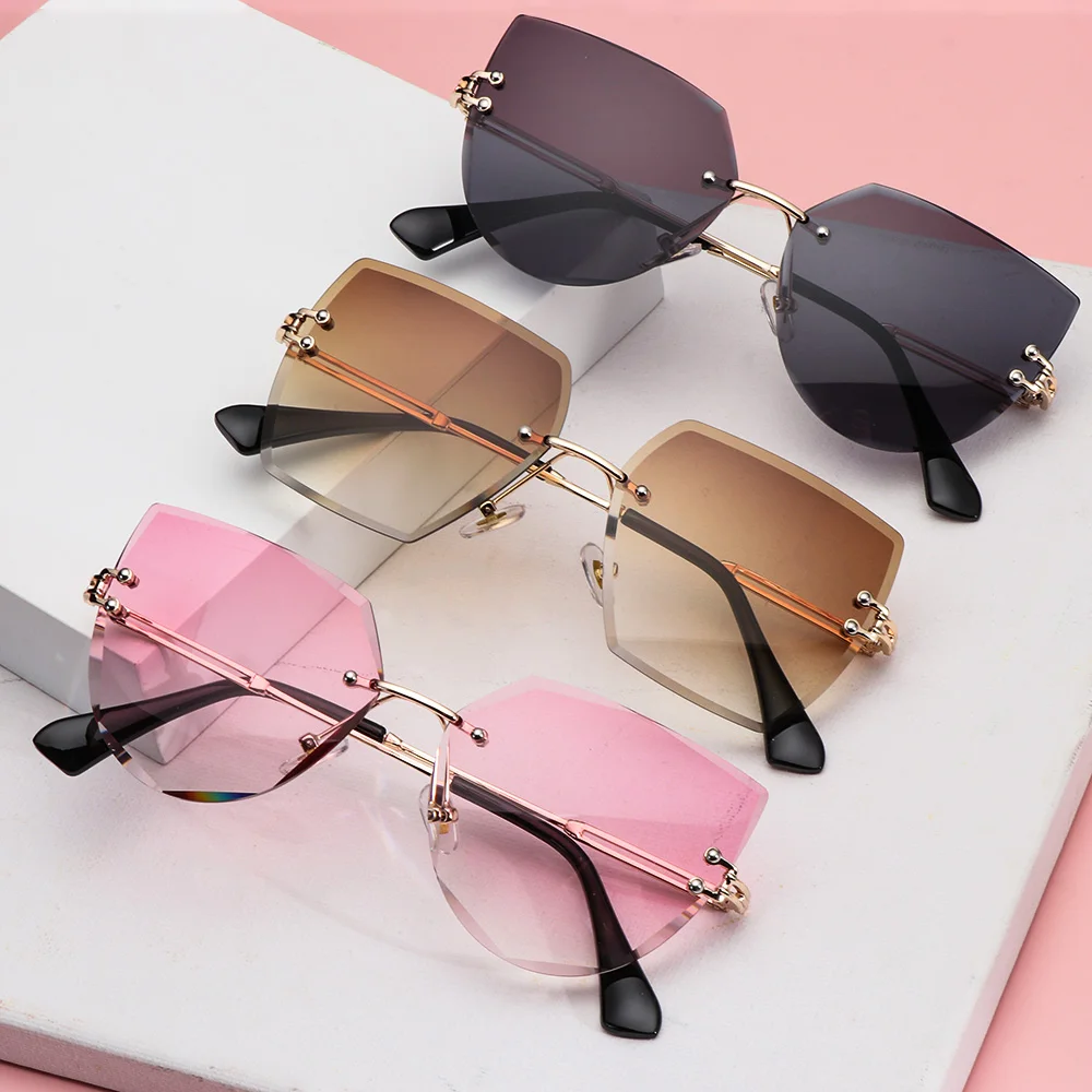 Sexy Rimless Cat Eye Sunglasses Luxury Design Women Metal Sunglasses Fashion Shades UV400 Protection Eyewear 1pc polarized sunglasses,sports sunglasses,sport sunglasses,metal sunglasses