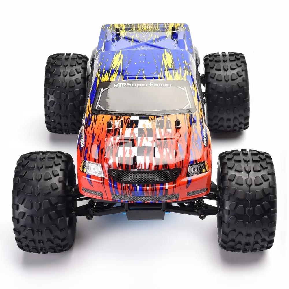 Vue arrière du buggy HSP 94188 1/10 4WD, avec l'aileron et l'échappement visibles.