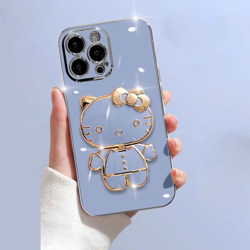thumbnail image 1 of Funda de lujo con soporte de espejo de Hello Kitty para iPhone 14, 11 Pro Max, 13, 12 Mini, XS, XR, X, 8, 7, 6S, 6 Plus, cubierta trasera de silicona suave, 1 of 5