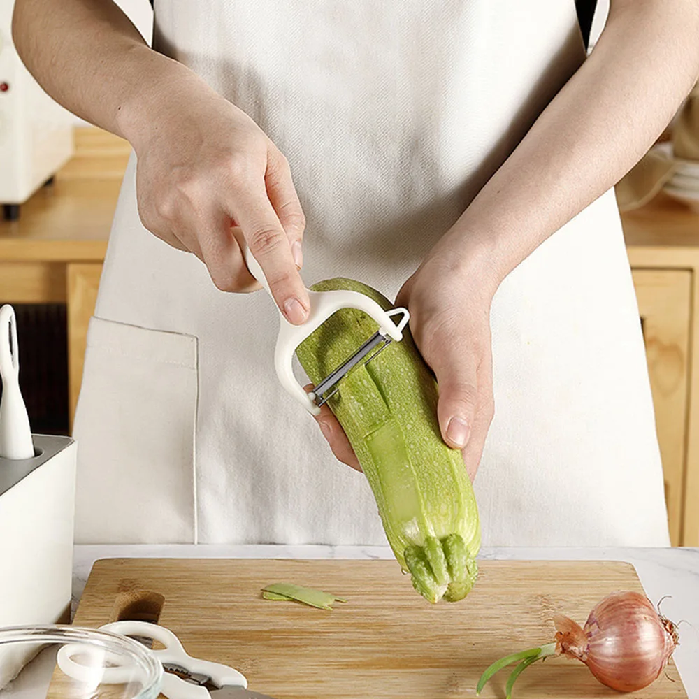 https://ae01.alicdn.com/kf/Sa36151acd0544e9ca8b39f3c7df321baV/4-5pcs-Kitchen-Gadgets-Set-Stainless-Steel-Utensils-Fruit-And-Vegetable-Peeler-Multiple-Function-Gadgets-Paring.jpg