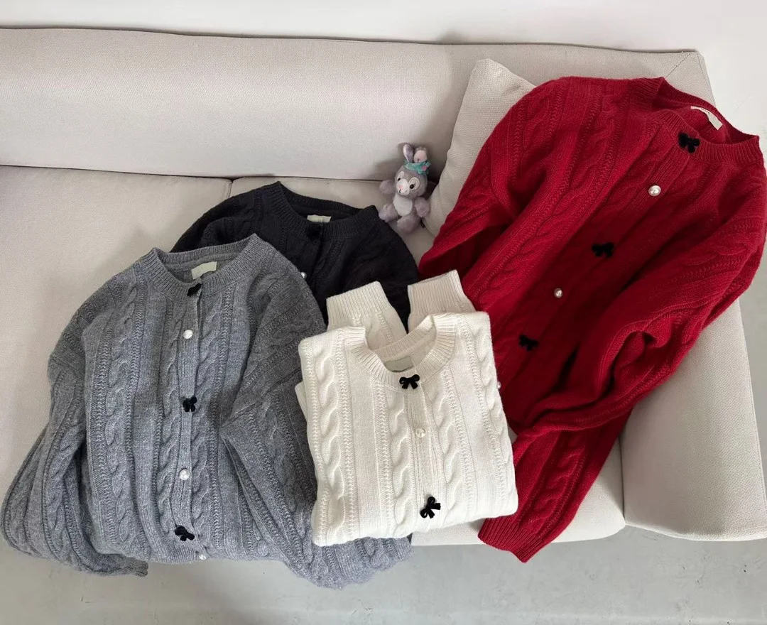 

Women's Clothing Fashion Bow Pearl Button Knitted Cardigan 169