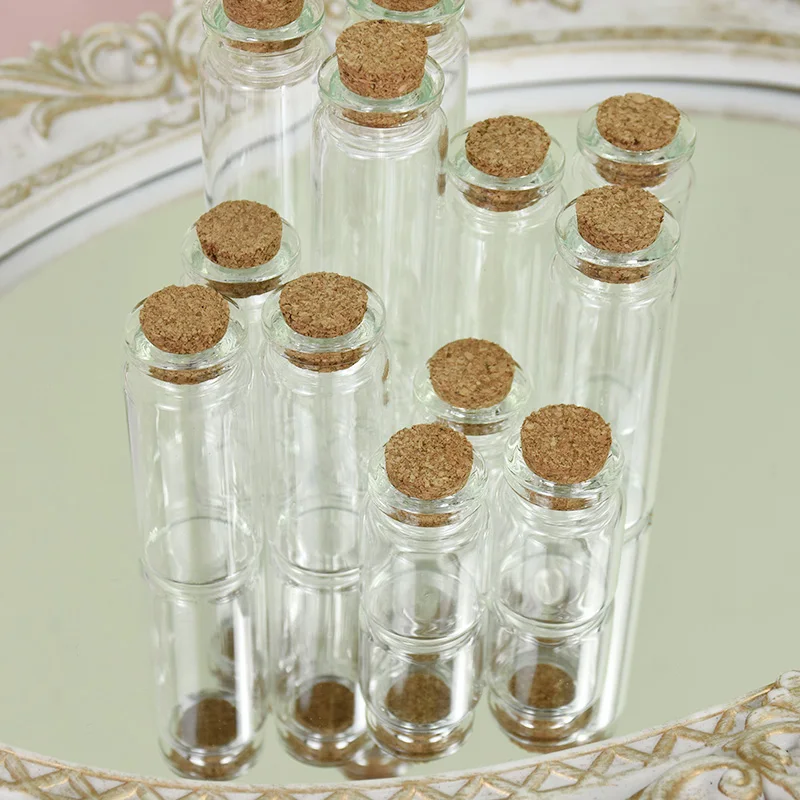 https://ae01.alicdn.com/kf/Sa375f8ec833547399be1e11ad100d7727/5Pcs-Mini-Clear-Glass-Bottles-With-Cork-Stopper-DIY-Empty-Message-Small-Jars-Wishing-Bottle-Wedding.jpg