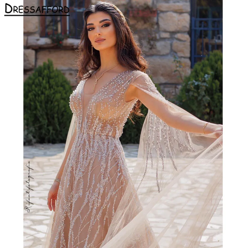 

Dubai Arabic Luxury Nude A Line Beaded Evening Dresses With Cape Sleeves Gowns For Women Wedding Party 2023