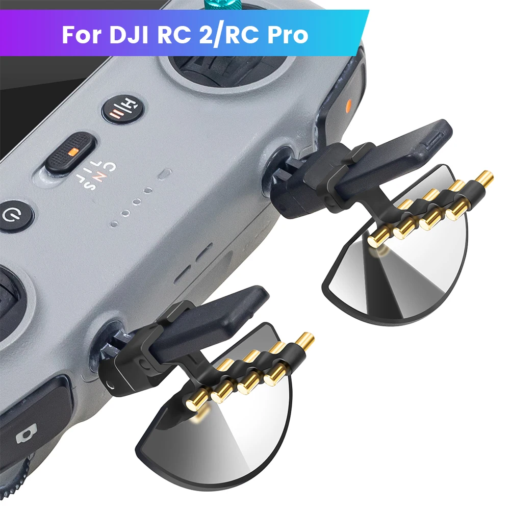 Lot de deux extenseurs d'antenne noir pour DJI RC 2 et RC Pro, posés sur une surface plane, améliorant la portée du signal.