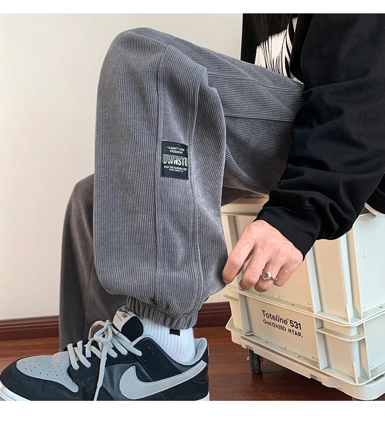 بنطلون رجالي جديد 2025 من قماش الكوردروي مبطن بالصوف فضفاض للعمل والرياضة في الخريف والشتاء مقاوم للتآكل ومضاد للأوساخ