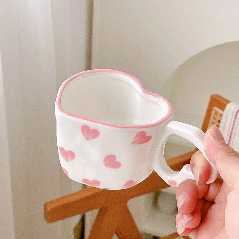 https://ae01.alicdn.com/kf/Sa3a31252ae61499998e046e2ca034e33P/Ins-Cute-Mug-Pink-Love-Ceramic-Coffee-Cup-Creative-Heart-shaped-Milk-Cups-Kitchen-Breakfast-Drinking.jpg