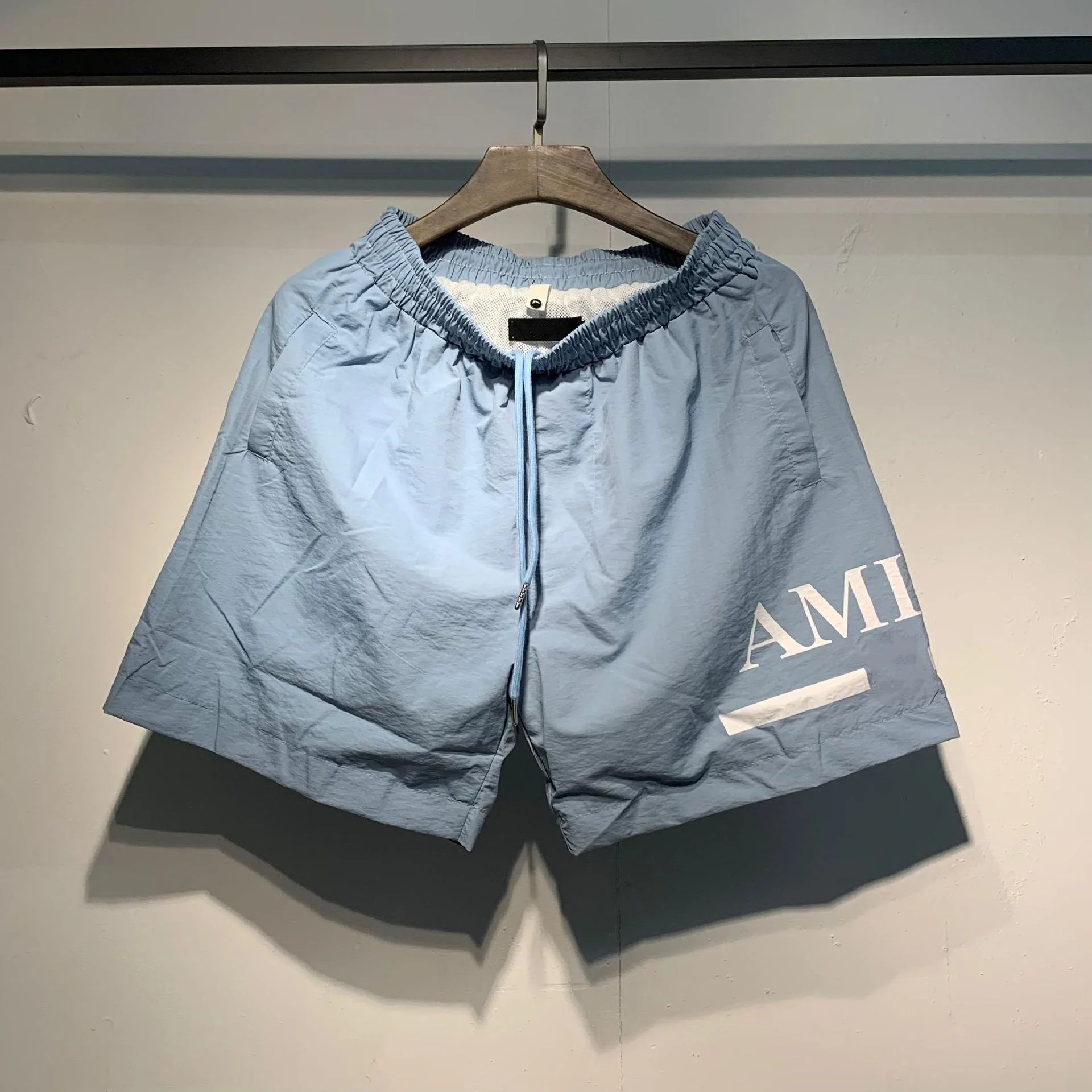 2025 Classic Letter Printed Beach Casual Pants Drawstring Summer Men's and Women's Loose Speed Drying Straight Shorts 1