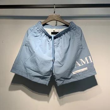 2025 Classic Letter Printed Beach Casual Pants Drawstring Summer Men's and Women's Loose Speed Drying Straight Shorts 1