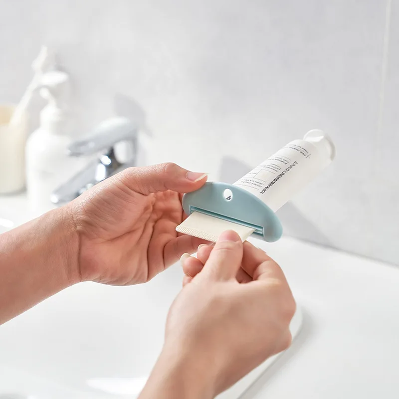 

Manual and Portable Toothpaste Dispenser Toothpaste Holder Accessories Waste Free Creative Cream Tube Extruder Bathroom Accessor