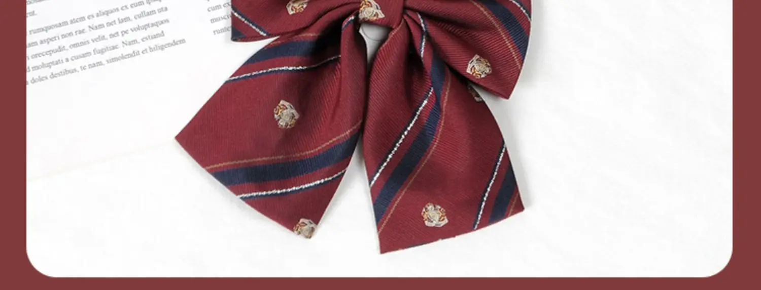 Multiple striped bow ties displayed on white and book background