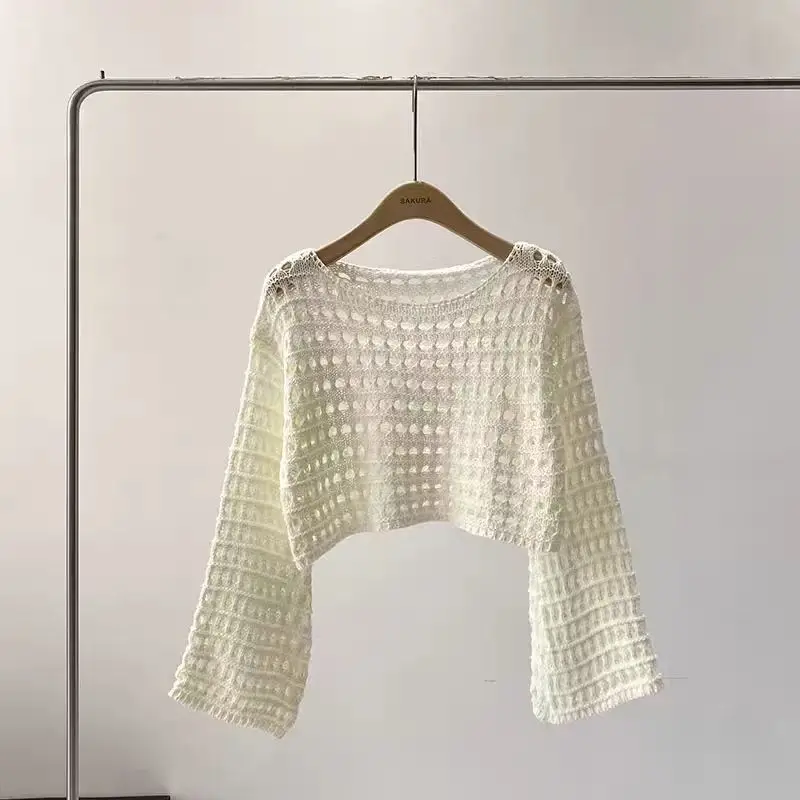 Spring and summer new French short long-sleeved hollow knitted sweater women's design sense thin sunscreen blouse top