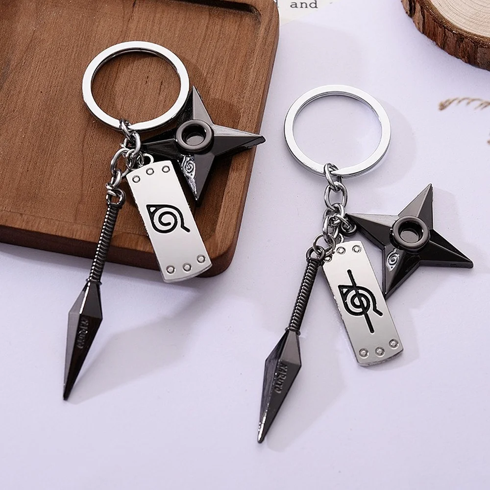 2021 Anime Naruto Konoha Rebel Forehead Shuriken Kunai Three-piece Alloy Keychain Accessories Ladies Jewelry Backpack. |