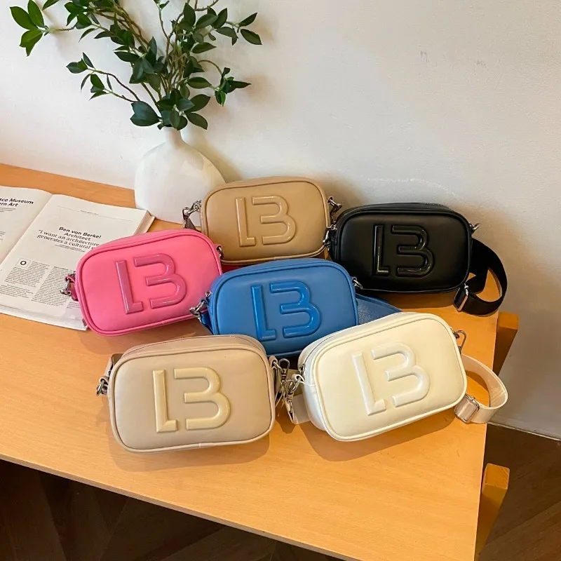 2025 Sophisticated Saddle Bag Functional Curved Design Compact Yet Spacious Confident Professional Look