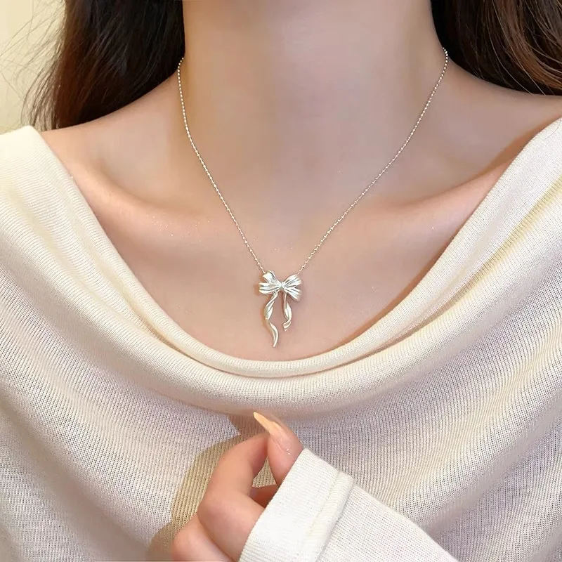 2025 New Trendy Silver Color Bow Pendant Necklace For Woman