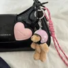 Fashion helmet small pendant leather bag decoration hiking rope keychain bag decoration hanging chain 1