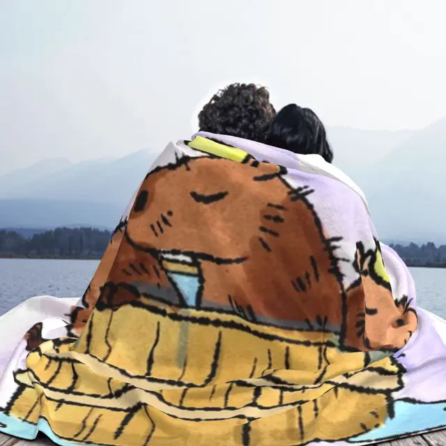 Capybara Onsen Blanket: Stay warm and cozy this winter with our high-quality flannel blanket.