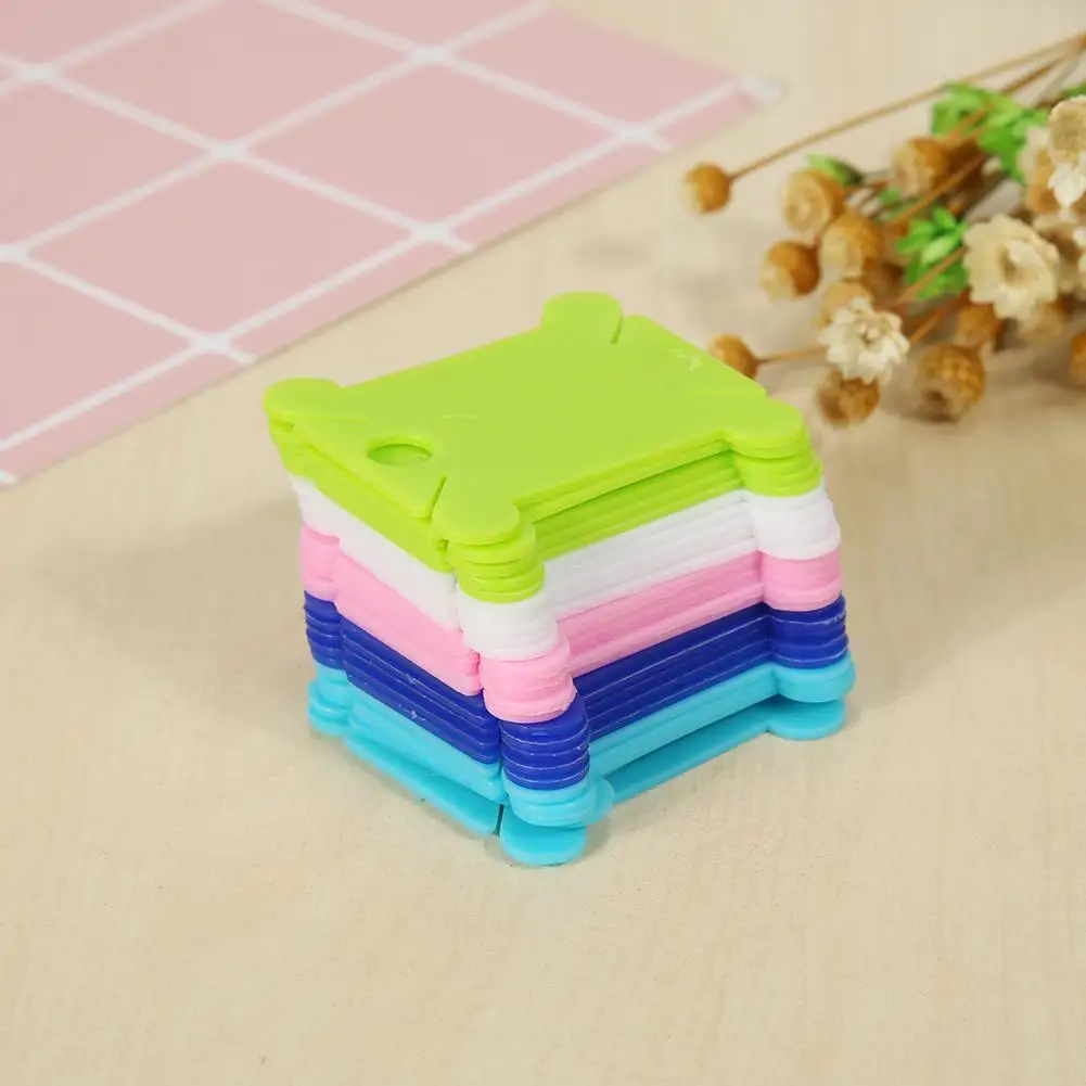 

25pcs plastic coloured string winders