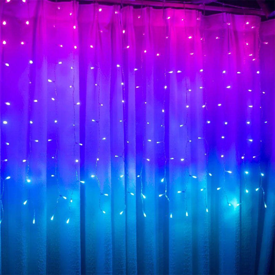 thumbnail image 1 of Cortina de luces LED de 300 LED, color rosa, morado y azul, con degradado, para Navidad, con luces de arcoíris, para decoración de habitación de niñas, 3 x 3 m, 1 of 4
