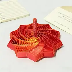 Sensory Fidget Star Illusion: Whirling Spiral Ornament (Orange)
