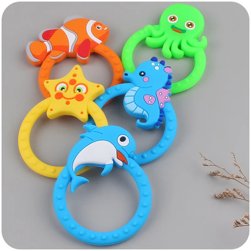 

Baby Silicone Teething Toys Newborn Hand-Held Pacifier Ring 0 6 Month Old Baby Cartoon Marine Animal Chewing Accessories Toys
