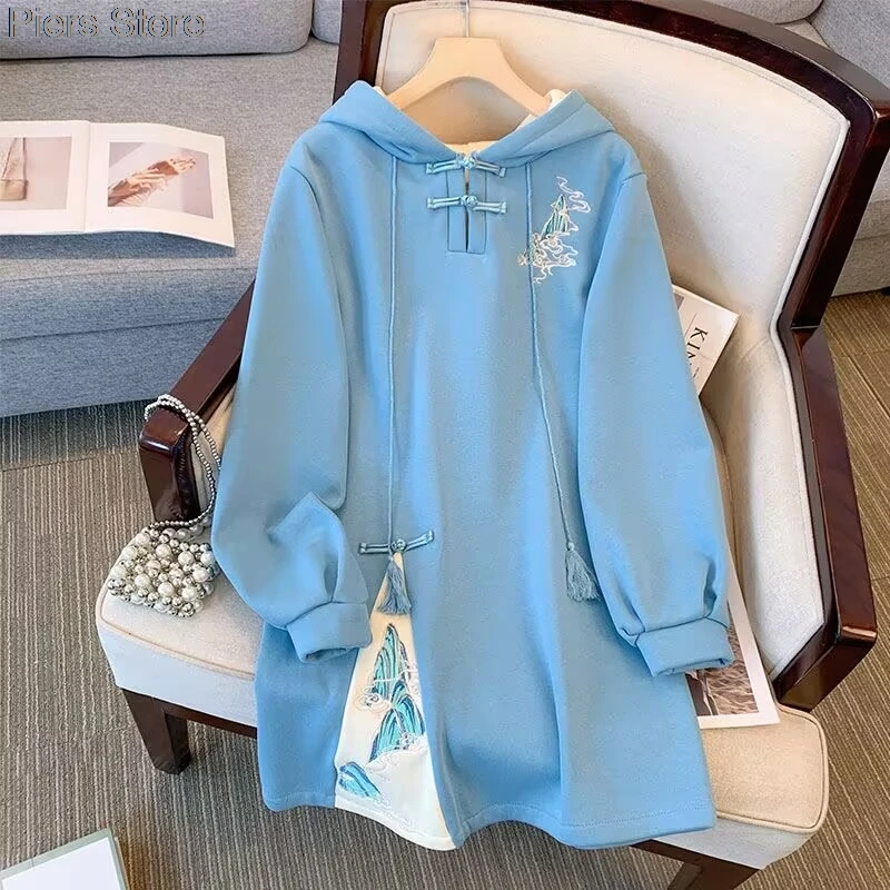 Model wearing the hoodie in a styled setting